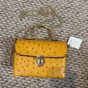Elegant Yellow Handbag with Gold Chain